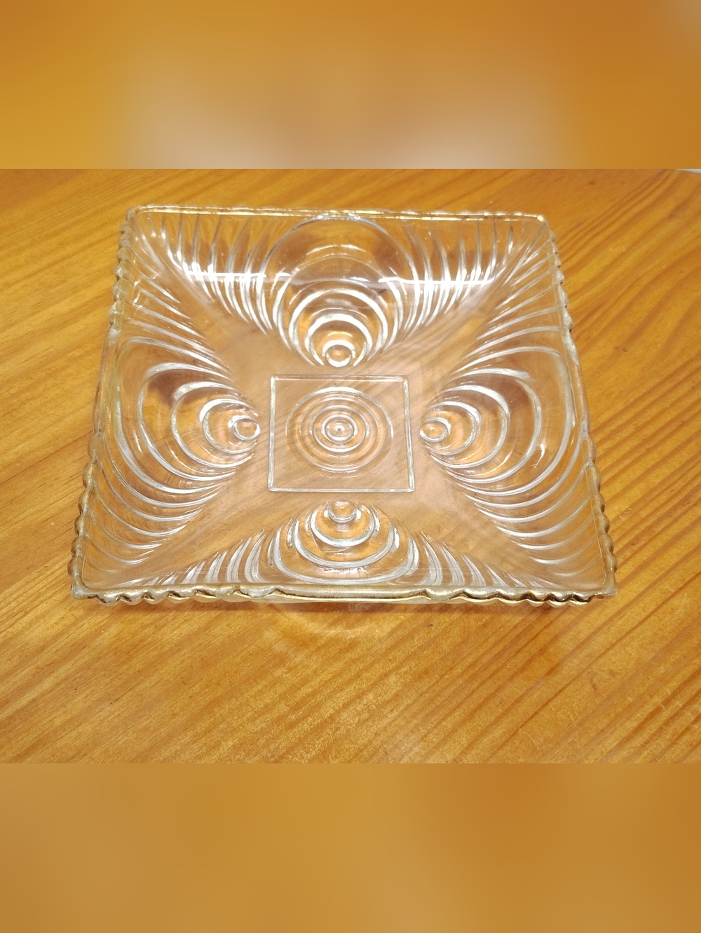Clear pressed glass square candy dish with concentric circle 'Sonicwave' pattern